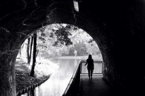 Girl runs through tunnel