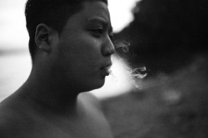 Young boy smoking